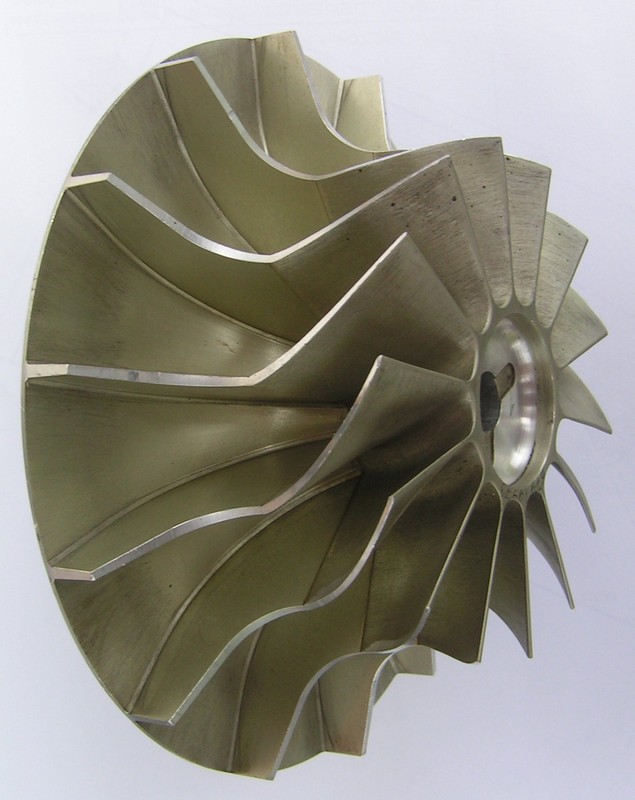 an impeller of radial compressor which is fixed by andhesive from one a duralumin cast and precision duralumin forging.